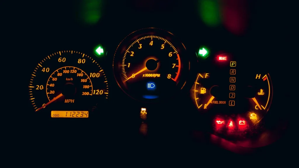 Car dashboard with warning lights